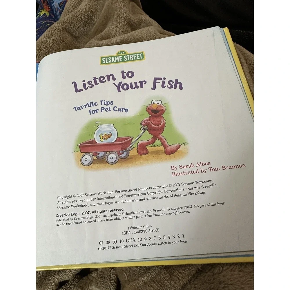Listen to Your Fish Terrific Tips for Pet Care Sesame Street Hardcover Book Elmo